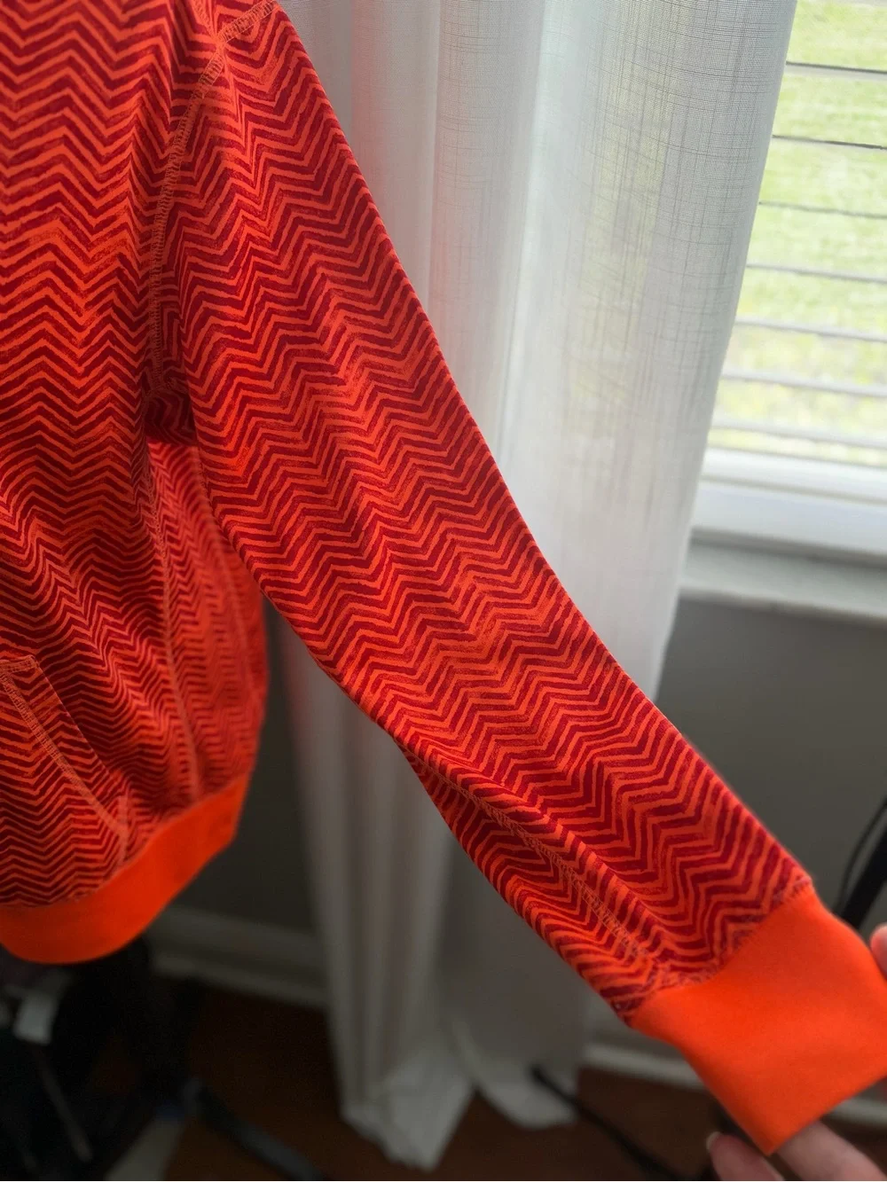 Nike Red-Orange Chevron Pullover Hoodie with Black Swoosh